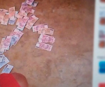 Jovem aparece em post com dinheiro que teria sido roubado 