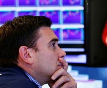Operador observa desempenho das ações na NYSE, nos EUA