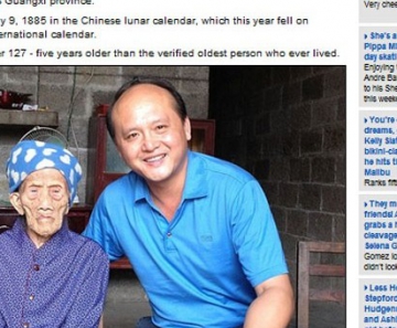 chinesa que diz ter 127 anos posa ao lado do único filho 