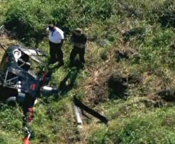 Helicóptero pousado em gramado do Parque Ecológico do Tietê 