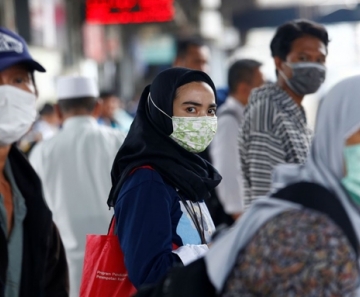 Número de mortos na China agora é de 1.350 - Foto: Ajeng Dinar Ulfiana